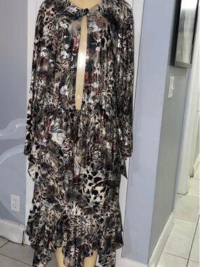 Animal Print Knit Dress with Ruffled Hem